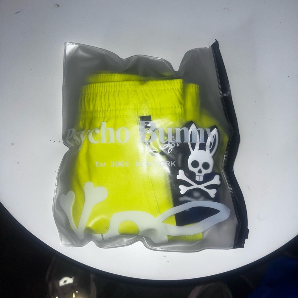 Psycho Bunny Bright Yellow Swim Trunks.